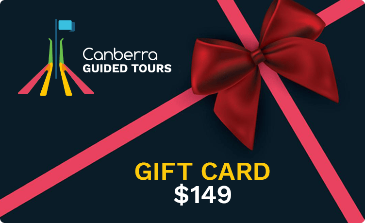 Best Of Wildlife Tour GIFT CARD 02 - Canberra Guided Tours Dark navy gift-card design for Canberra Guided Tours with the company logo at top left, diagonal pink ribbons and a red bow, and bold text reading GIFT CARD $149 in yellow and white.